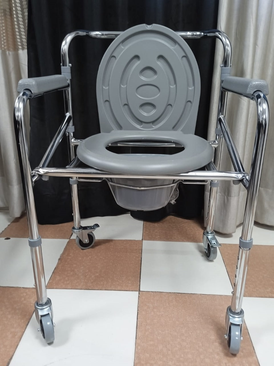 Gray commode chair with wheels 